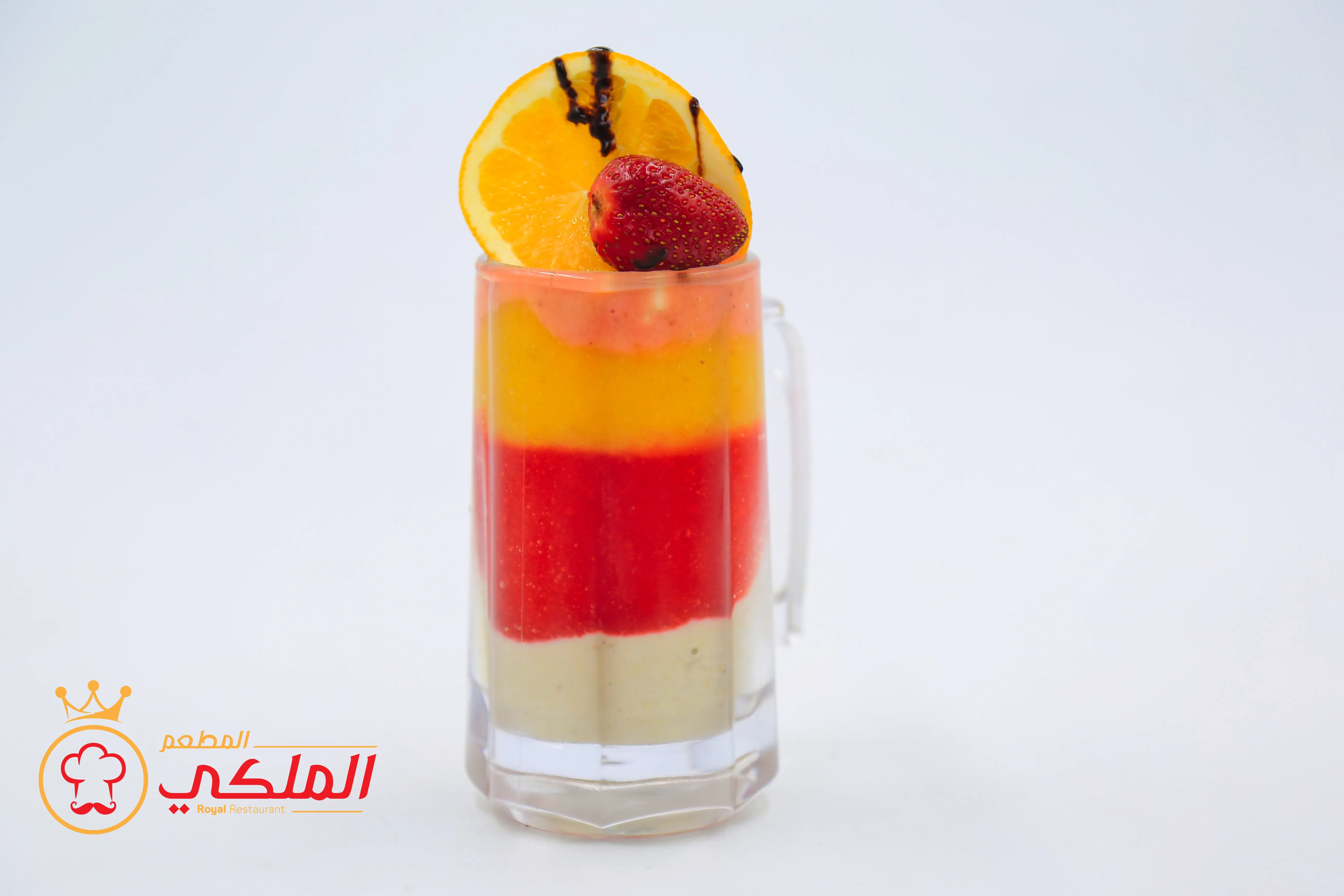 عصير طبقات ملكي - عصير طبقات ملكي فاخر في المطعم الملكي صنعاء. طبقات ملونة من فواكه فاخرة. جمالي ولذيذ. للصورة والطعم في أفضل مطعم بشارع خولان.